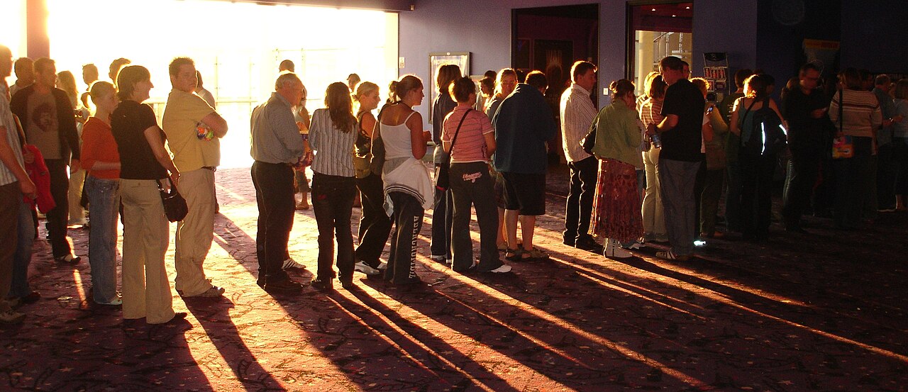 A cinema queue in evening light; contextual photograph, not an audience for the films discussed. Photo: